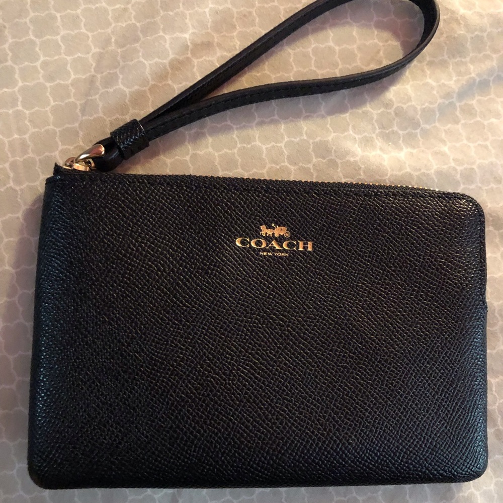- Coach wristlet wallet